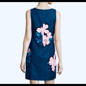 Taylor Dress NWT Size 6. Navy with pink flowers. Sleeveless sheath.